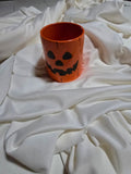 Tazza con zucca di Halloween sorridente
